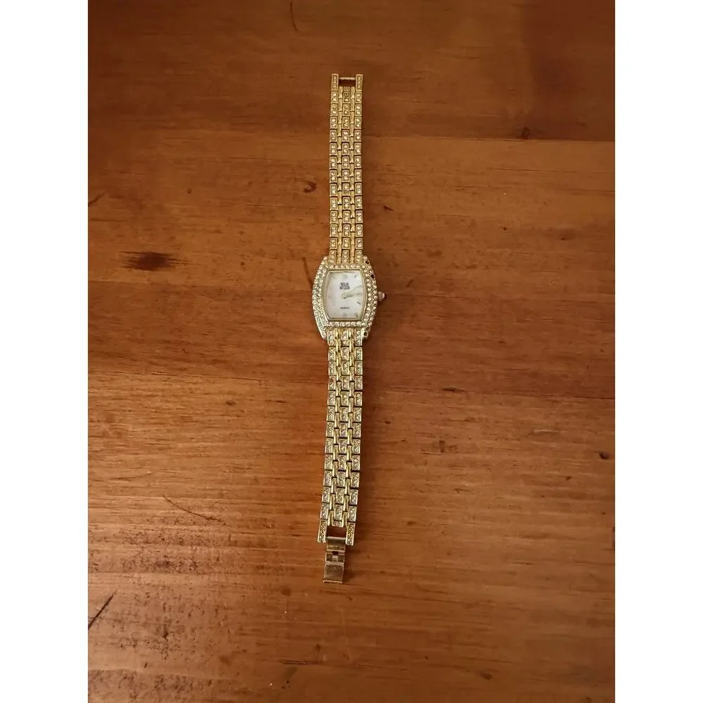 Nolan Miller Glamour Collection Crystal Gold Tone Bracelet Watch Mother Of Pearl